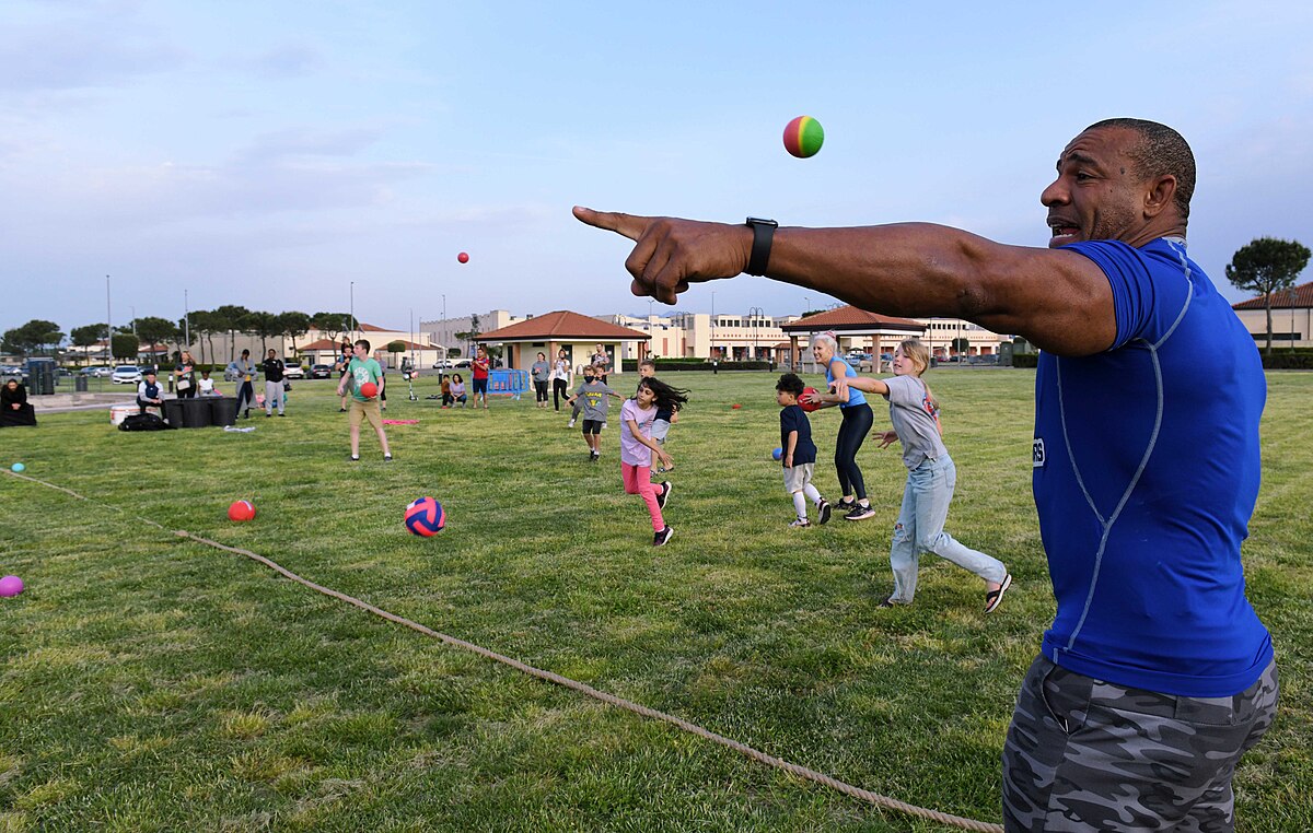 American Gladiators arena competition event with cast members