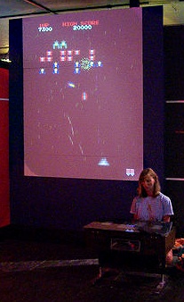 Galaga arcade game screen showing alien formations