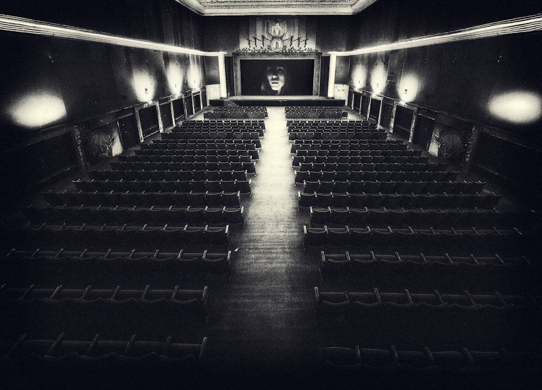 Empty vintage cinema hall — best 80s movies featured image