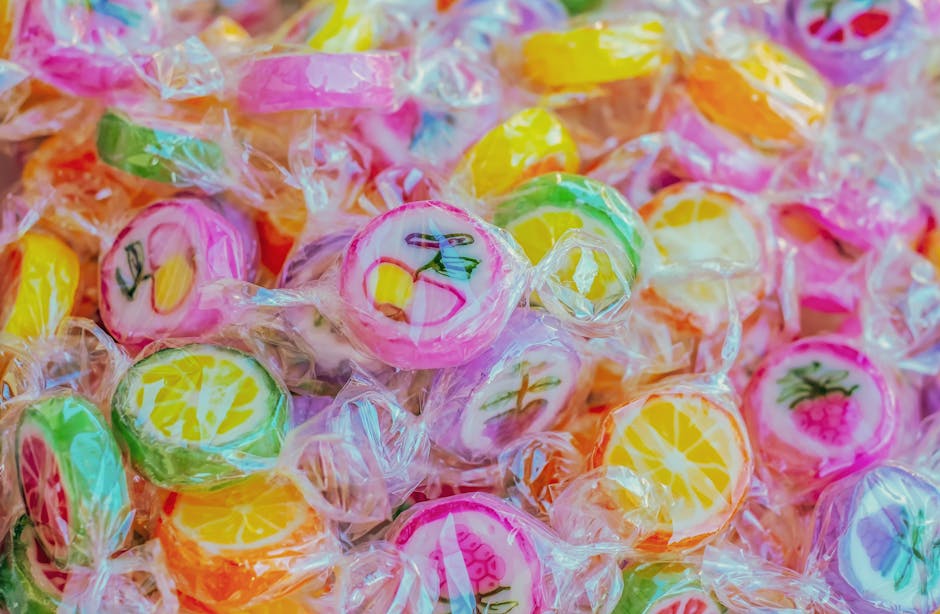 Colorful 90s candy and snack assortment that defined childhood