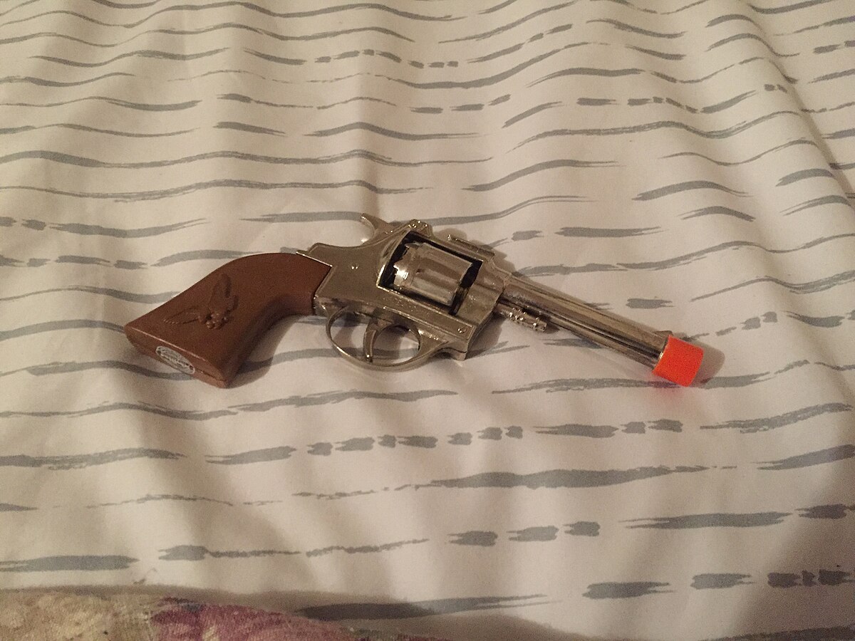 Classic vintage metal cap gun revolver toy from the 80s