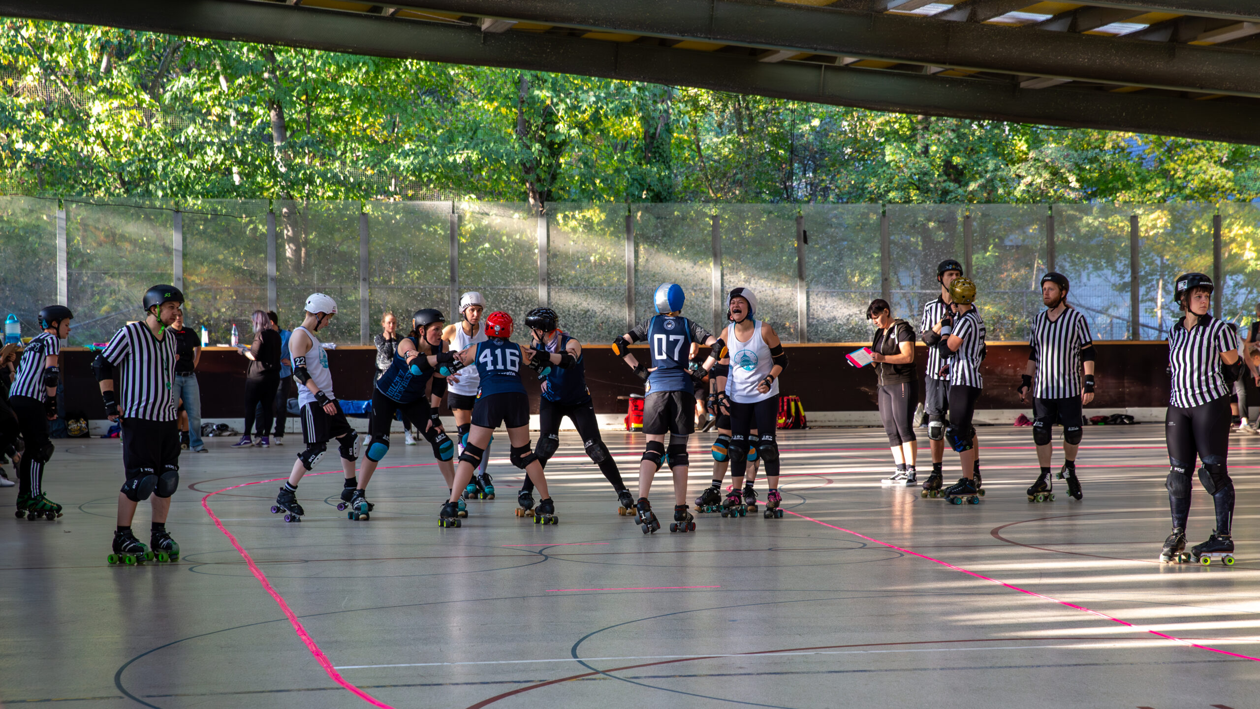 Roller derby bout showing the physicality and excitement of the sport