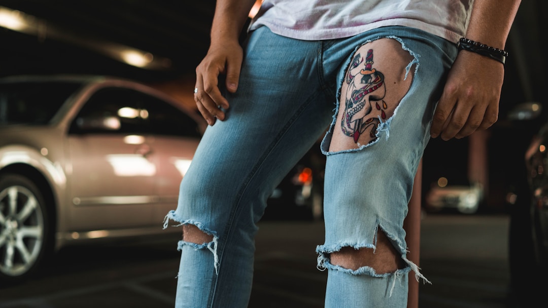 Distressed ripped jeans 90s grunge fashion staple