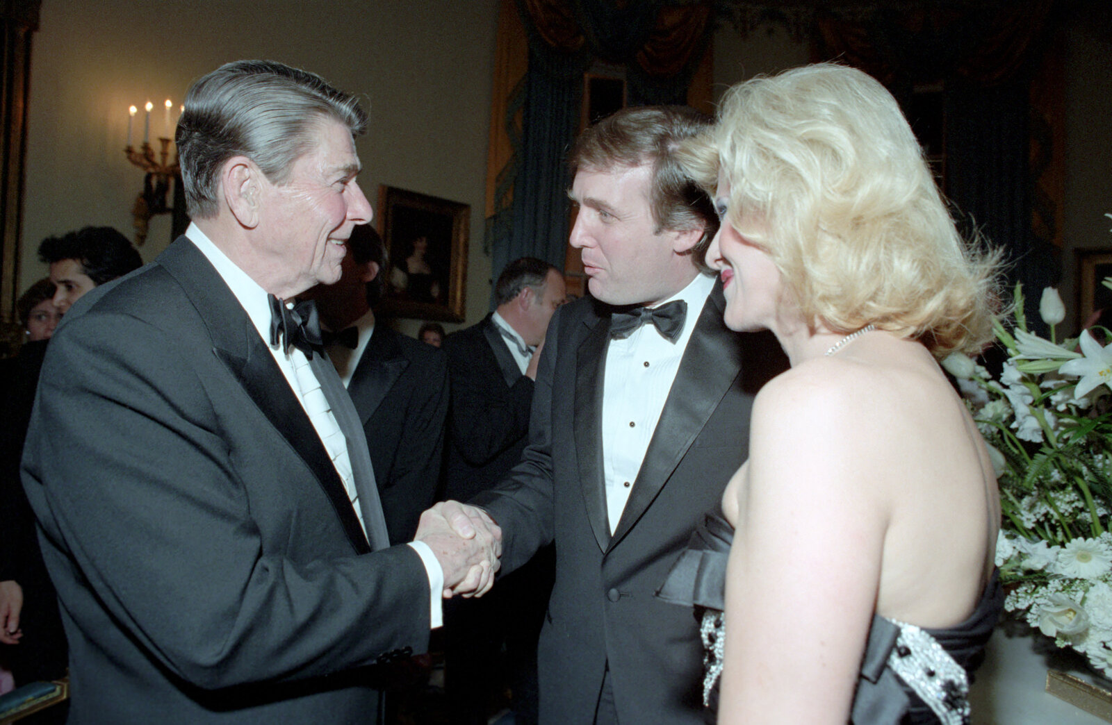 Donald Trump and Ivana Trump shaking hands with President Ronald Reagan 1985
