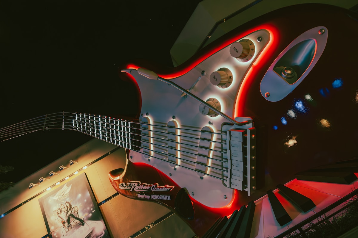 Electric guitar with neon lights representing 1980s heavy metal era