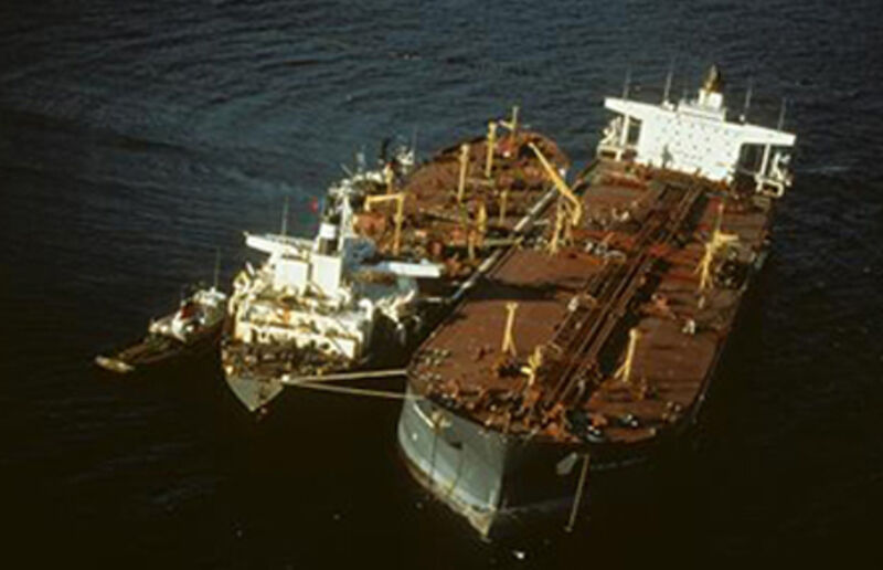 Aerial view of the Exxon Valdez oil spill spreading across Prince William Sound Alaska