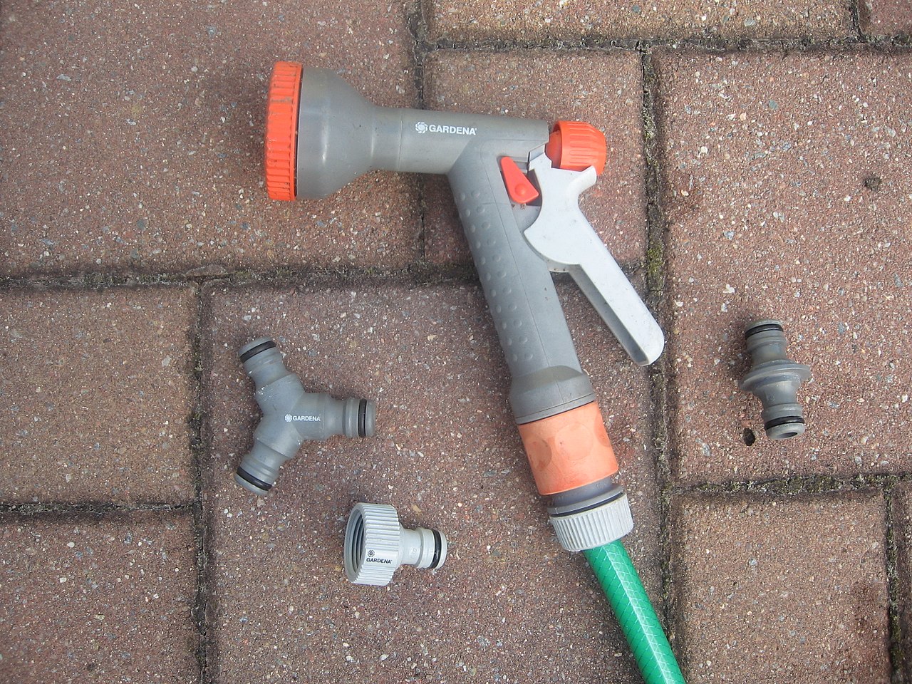 Garden hose nozzle pistol sprayer used for summer water play