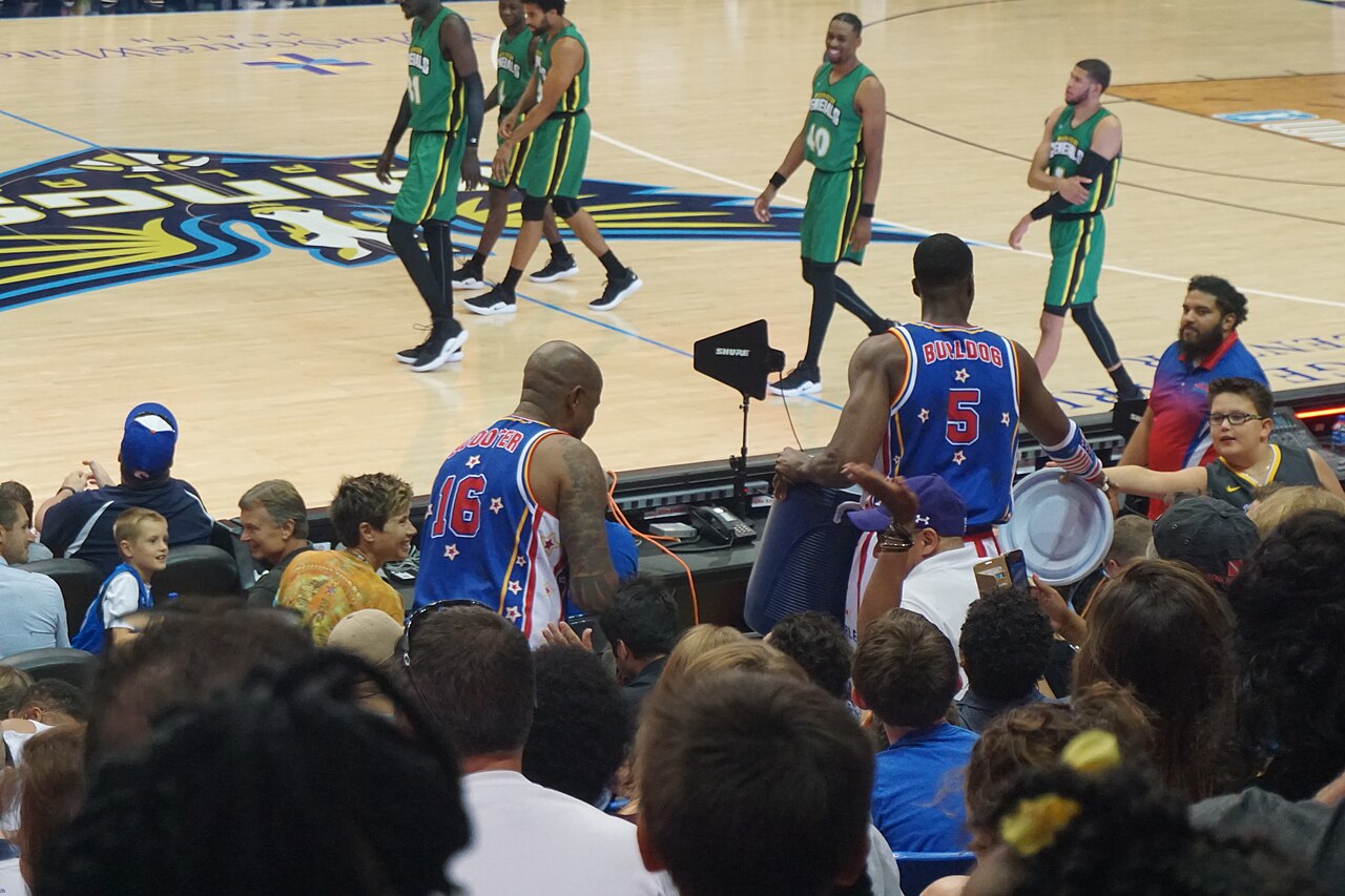 Harlem Globetrotters performing their classic water bucket comedy skit