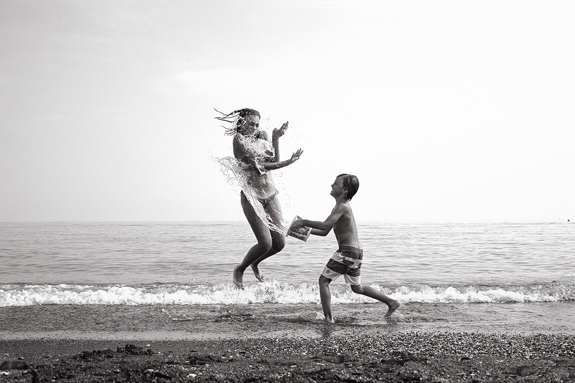 Hot summer day perfect for playing outside and drinking from the garden hose