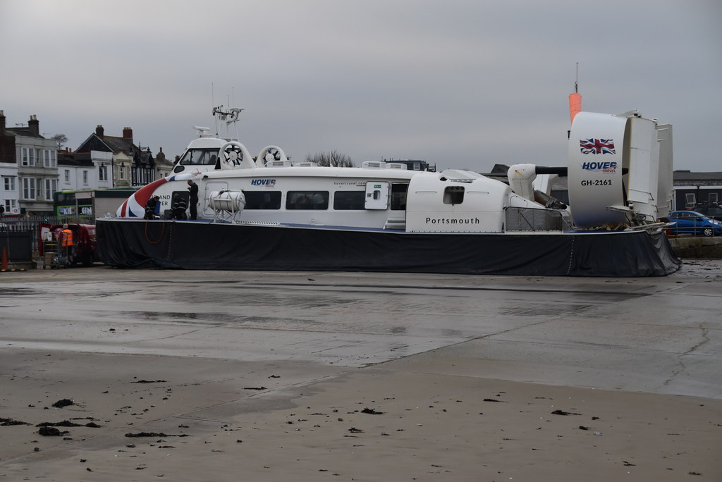 Full-size hovercraft crossing water showing the same air cushion technology used in Flymo hover mowers