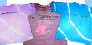 Collection of Hypercolor shirts in classic 90s neon colors including purple and blue
