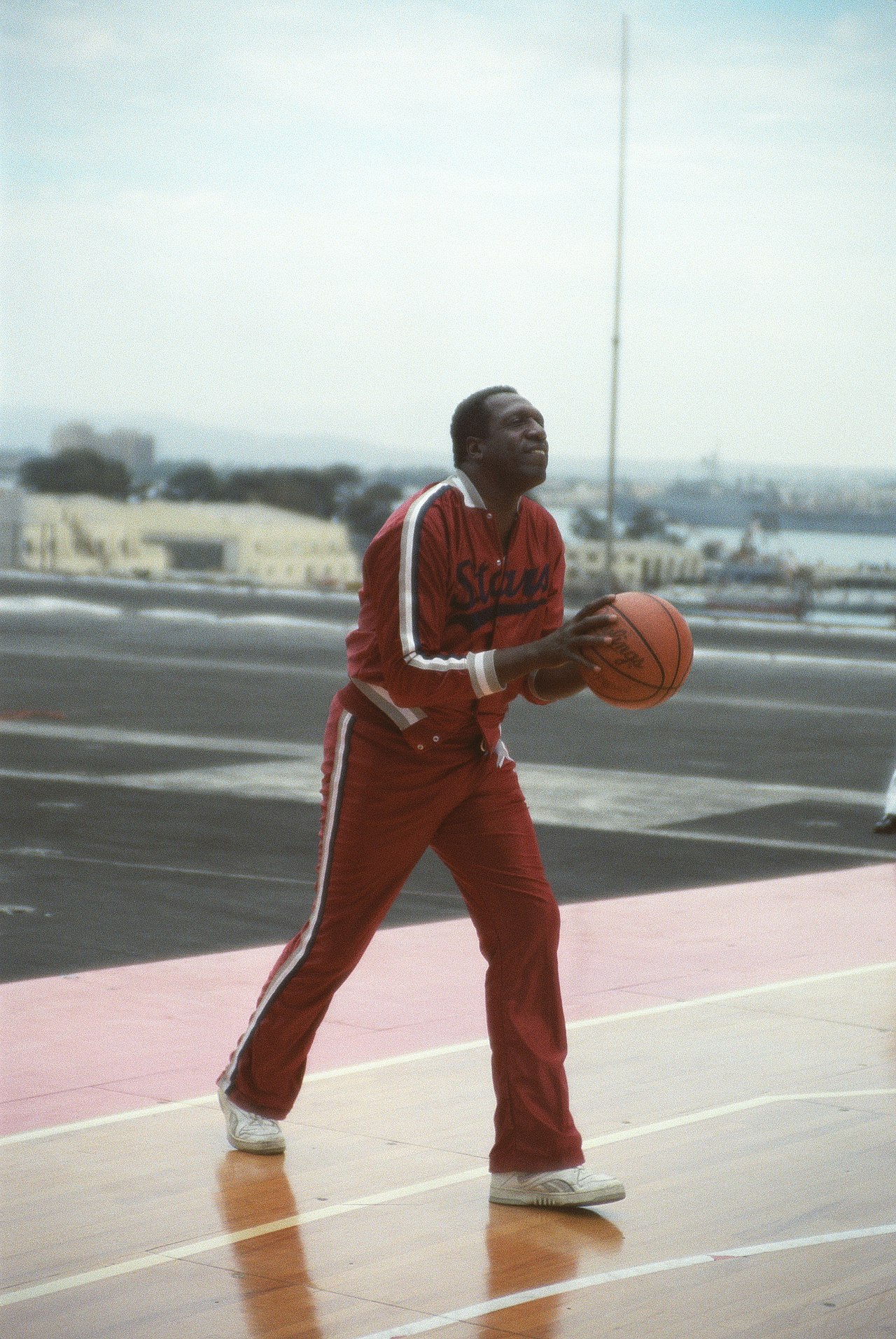 Meadowlark Lemon shooting a basketball for the Harlem Globetrotters