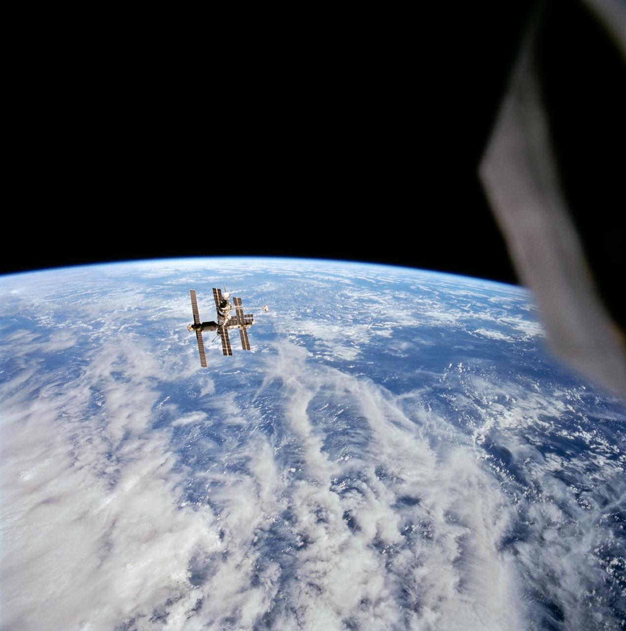 Mir space station photographed from Space Shuttle Discovery during orbital approach