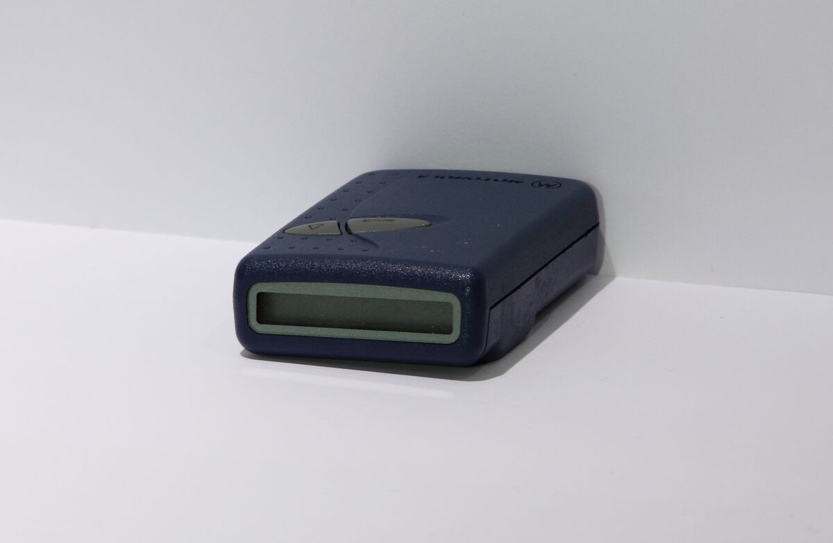 Motorola pager collection showing various models from the 90s beeper era