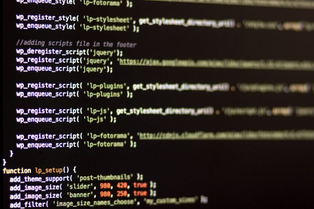 Programming code displayed on computer screen showing the type of development work that early wiki contributors engaged in