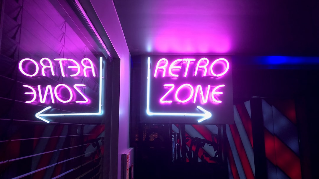 Retro zone neon signage evoking 80s fashion vibes