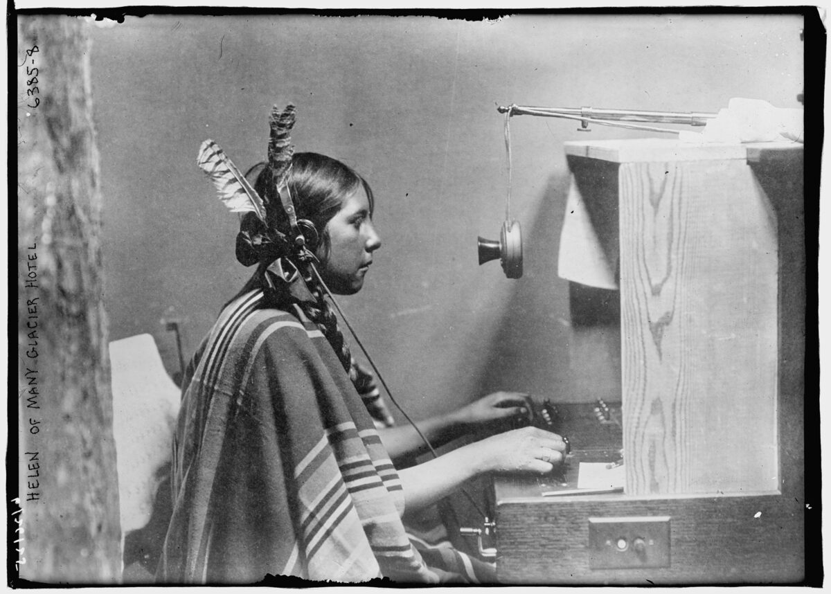 Female telephone switchboard operator early 1900s
