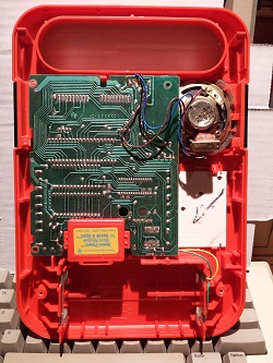 Close-up of the Speak and Spell keyboard and display with letter tiles