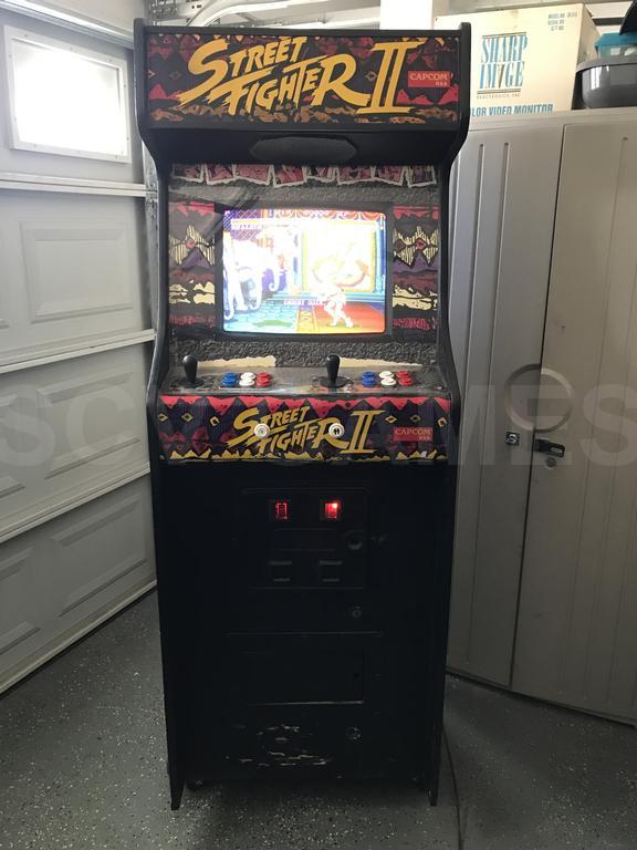 Street Fighter II arcade cabinet by Capcom that sparked the fighting game renaissance