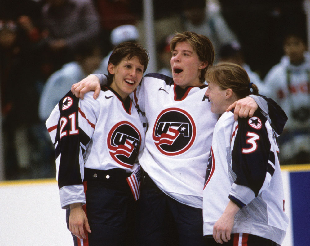 Cammi Granato, Karyn Bye and Lisa Brown-Miller celebrate Team USA winning the first women hockey gold medal at the 1998 Winter Olympics