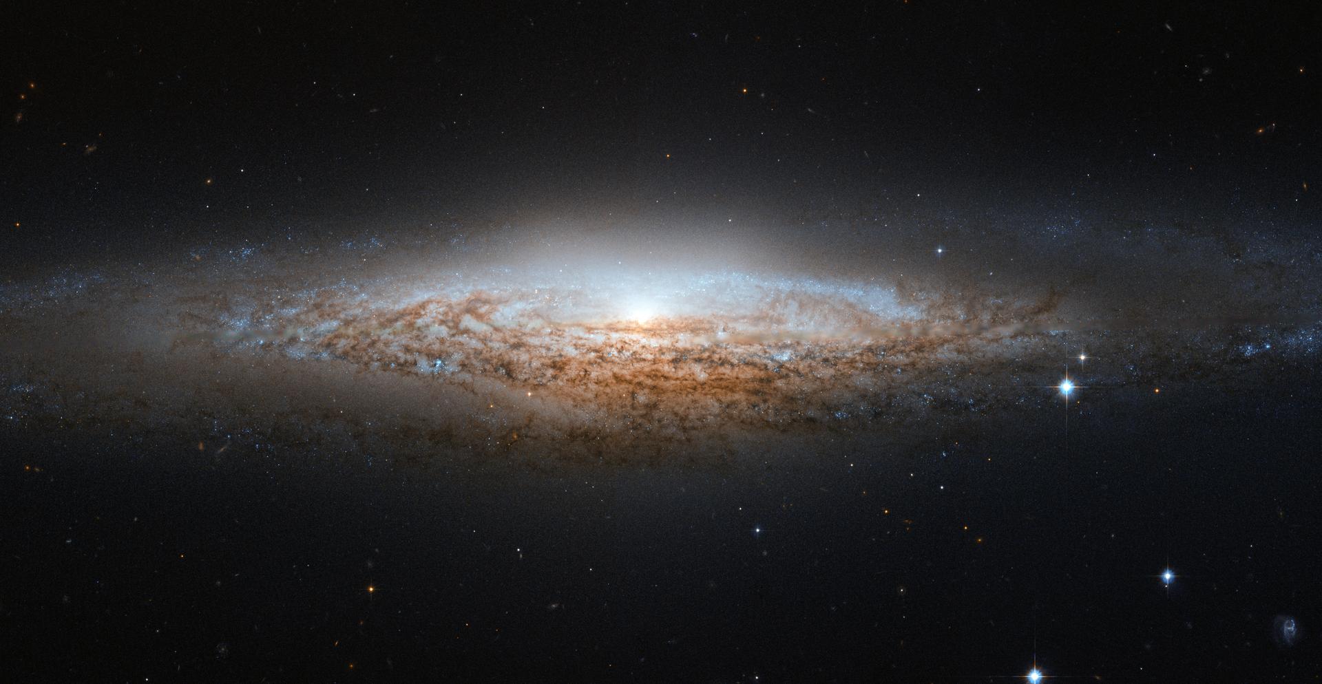 NGC 2683 spiral galaxy nicknamed UFO Galaxy by astronomers for its disc-like appearance resembling classic science fiction spaceship