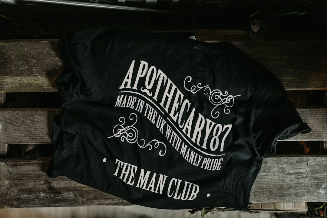 Vintage rock band tee shirts displayed for collectors