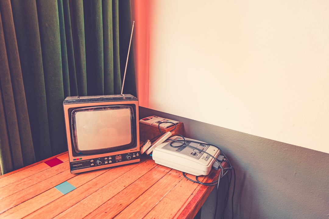 Vintage television and radio — staples of 90s living rooms