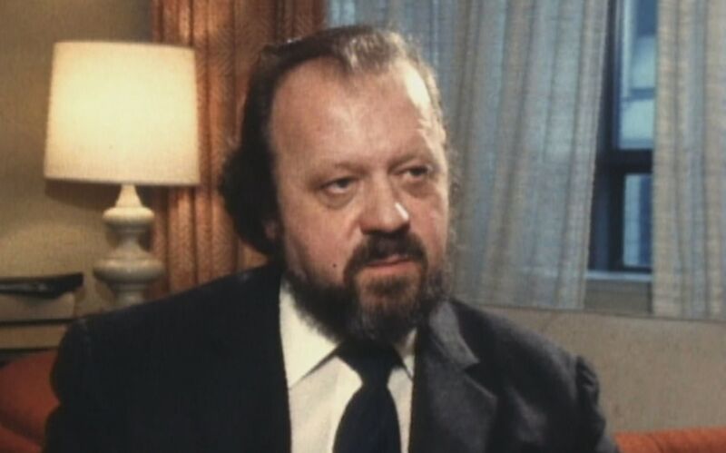 Fraggle Rock puppeteer working with puppet on Toronto set