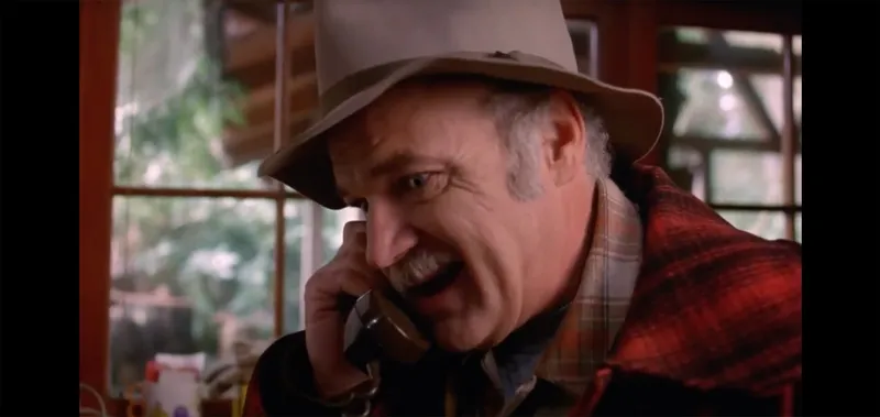 Pete Martell making the famous wrapped in plastic phone call in the Twin Peaks pilot episode