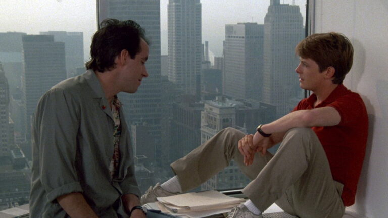The Secret of My Success rooftop scene over New York skyline