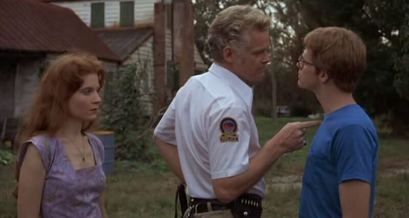 Squirm 1976 movie still of Mick arriving in the stormy Georgia town