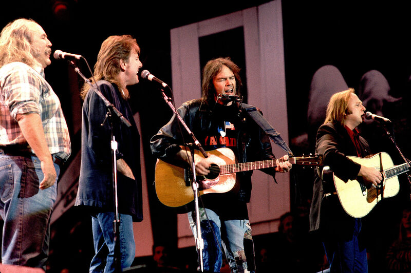 Crosby Stills Nash and Young performing at Farm Aid 1990