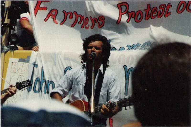 John Mellencamp performing at Farm Aid benefit concert