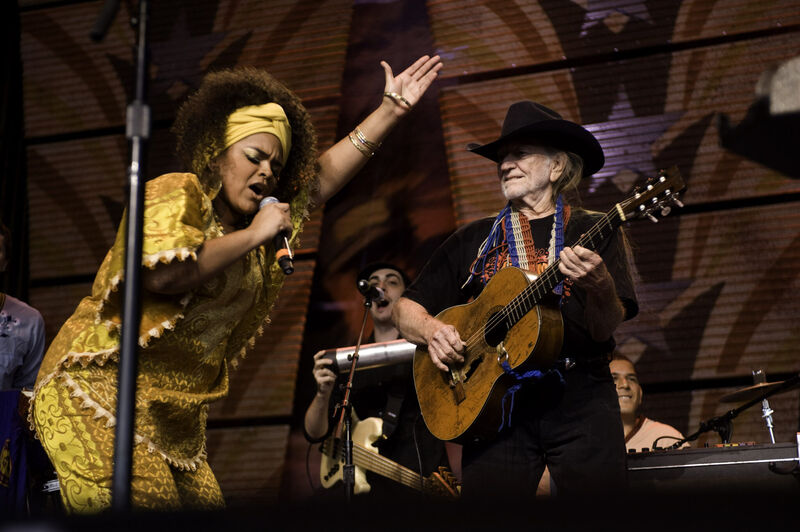Willie Nelson performing at Farm Aid benefit concert