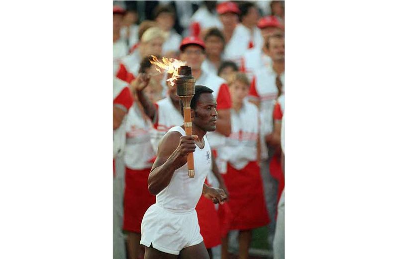 1984 Olympic torch relay runner during the cross-country journey to Los Angeles