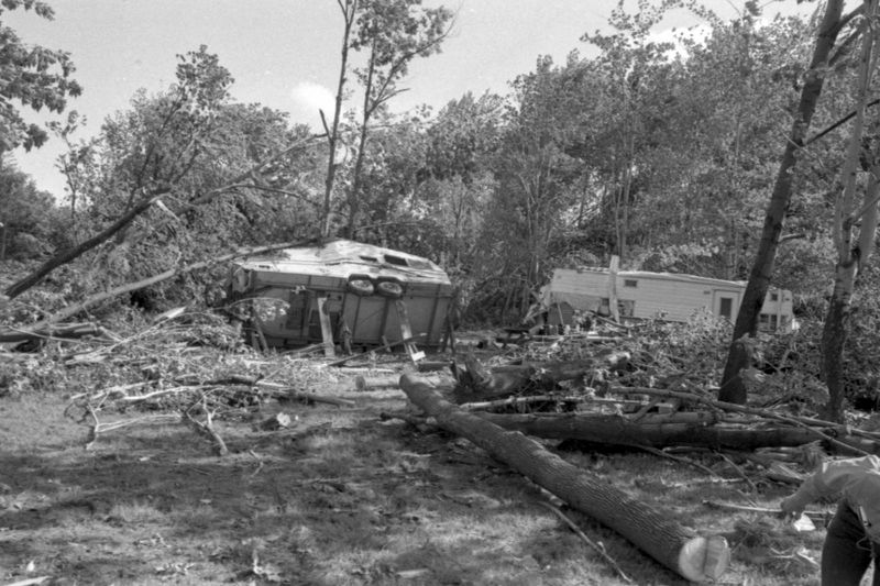Overturned trailer in trees after May 31 1985 tornado outbreak