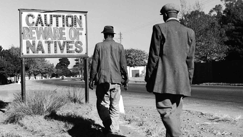 Apartheid era segregation signage in 1980s South Africa before Mandela's release