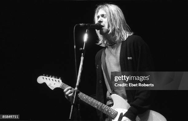 Kurt COBAIN and NIRVANA; Kurt Cobain performing live onstage at Colisuem
