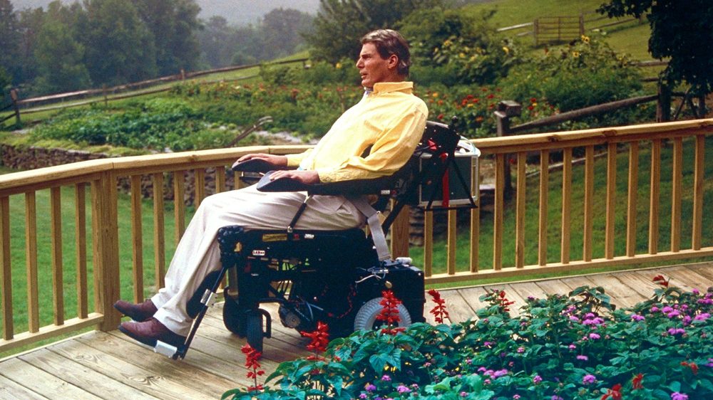 Christopher Reeve in his power wheelchair on the deck of his Pound Ridge home after the May 27, 1995 accident
