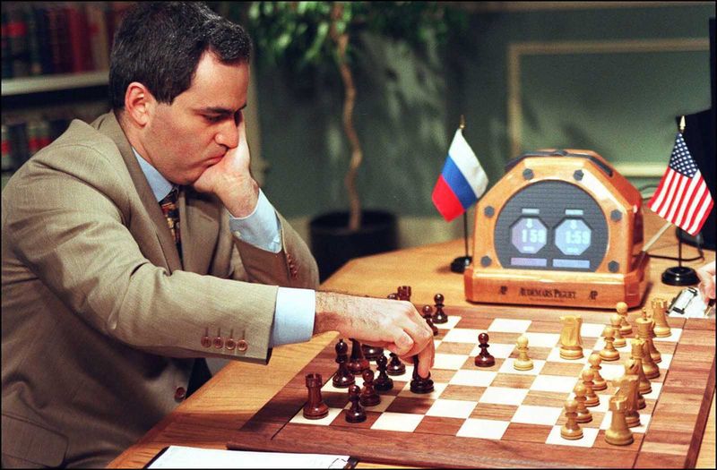 Garry Kasparov making a move in Game 2 of 1997 Deep Blue rematch