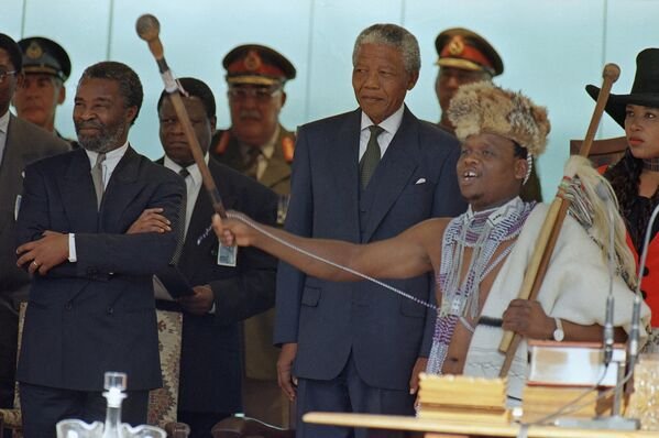 Praise singer in traditional Xhosa dress at the Mandela inauguration ceremony