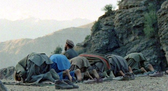 Mujahideen fighters at prayer in Kunar Valley 1987