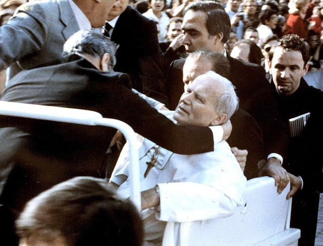 Pope John Paul II held by aides immediately after the 1981 shooting in St Peters Square