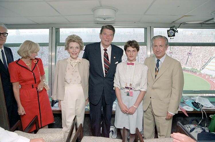 Ronald Reagan with Romanian gymnast Nadia Comaneci and IOC president Samaranch at the 1984 Olympics opening ceremony