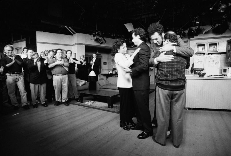 Seinfeld finale cast embrace on the Monk's Cafe set during the last day of taping in April 1998