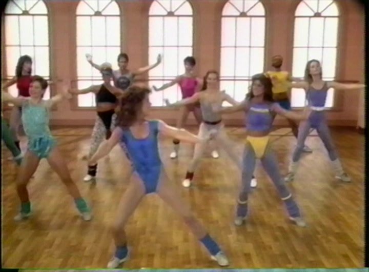 80s aerobics dance class with neon leotards 1986 Jane Fonda workout