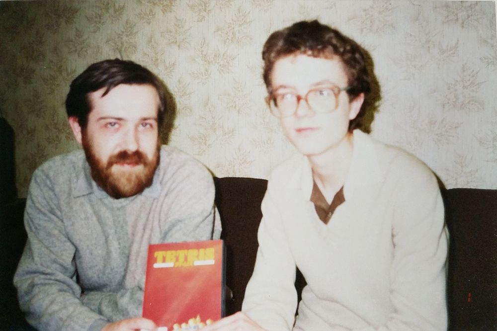 Alexey Pajitnov and Vadim Gerasimov hold Tetris box Moscow 1980s