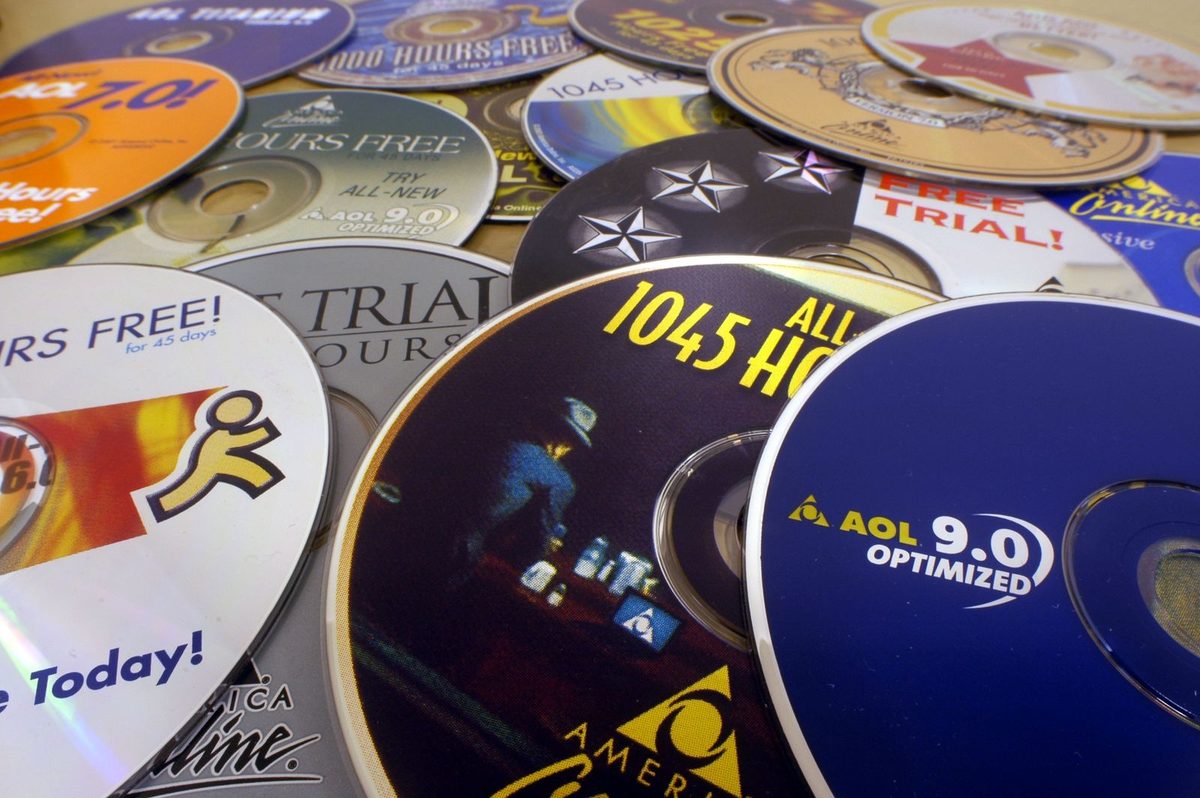 AOL free trial CDs piled together 90s internet