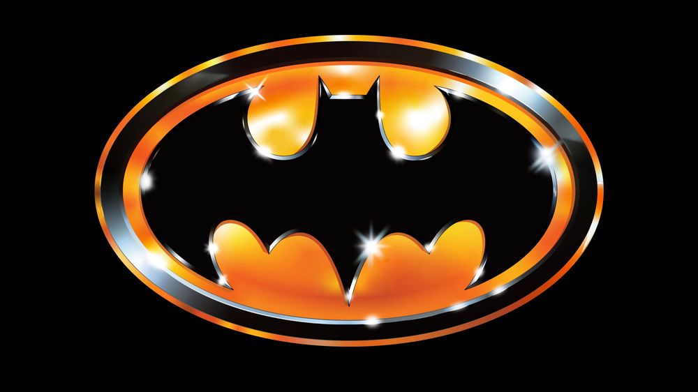 Batman 1989 yellow oval bat logo iconic Tim Burton movie