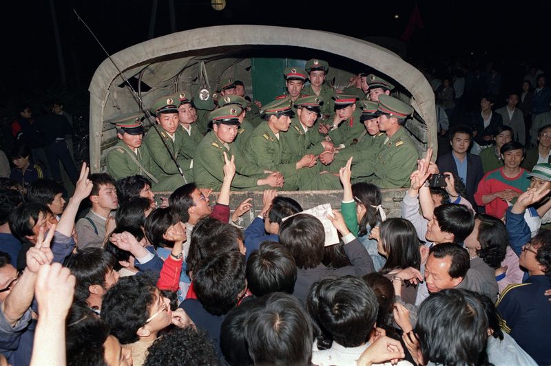 Beijing citizens surround a PLA truck May 20 1989 Tiananmen martial law